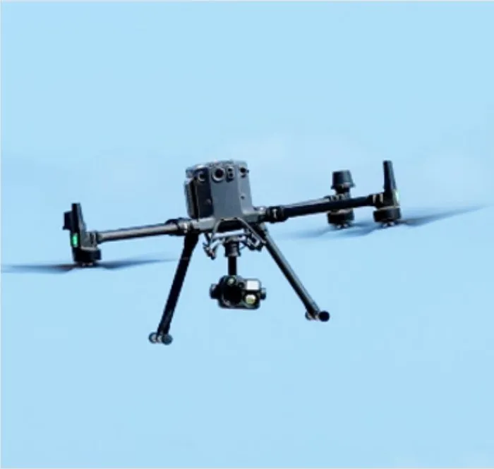 Aerial inspection drone surveying industrial assets